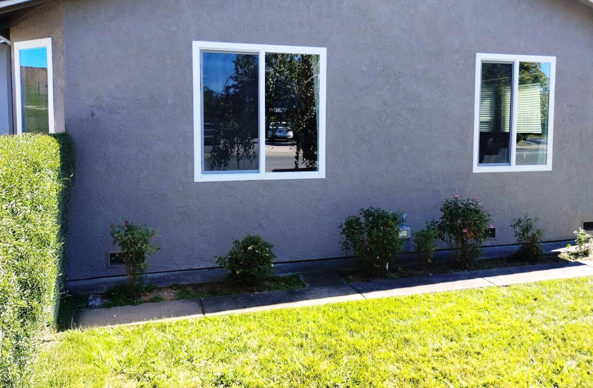 Energy-efficient vinyl sliding window installation in Sacramento, featuring dual-pane, low-E glass for improved insulation, UV protection, and effortless operation.